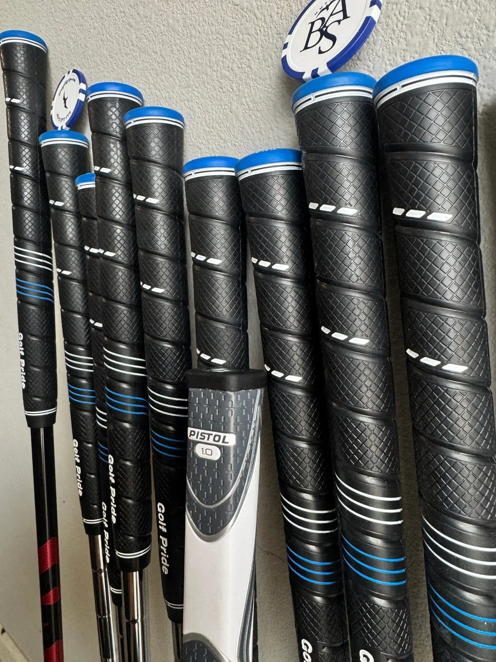 Close view of completed golf grips with a finished putter grip