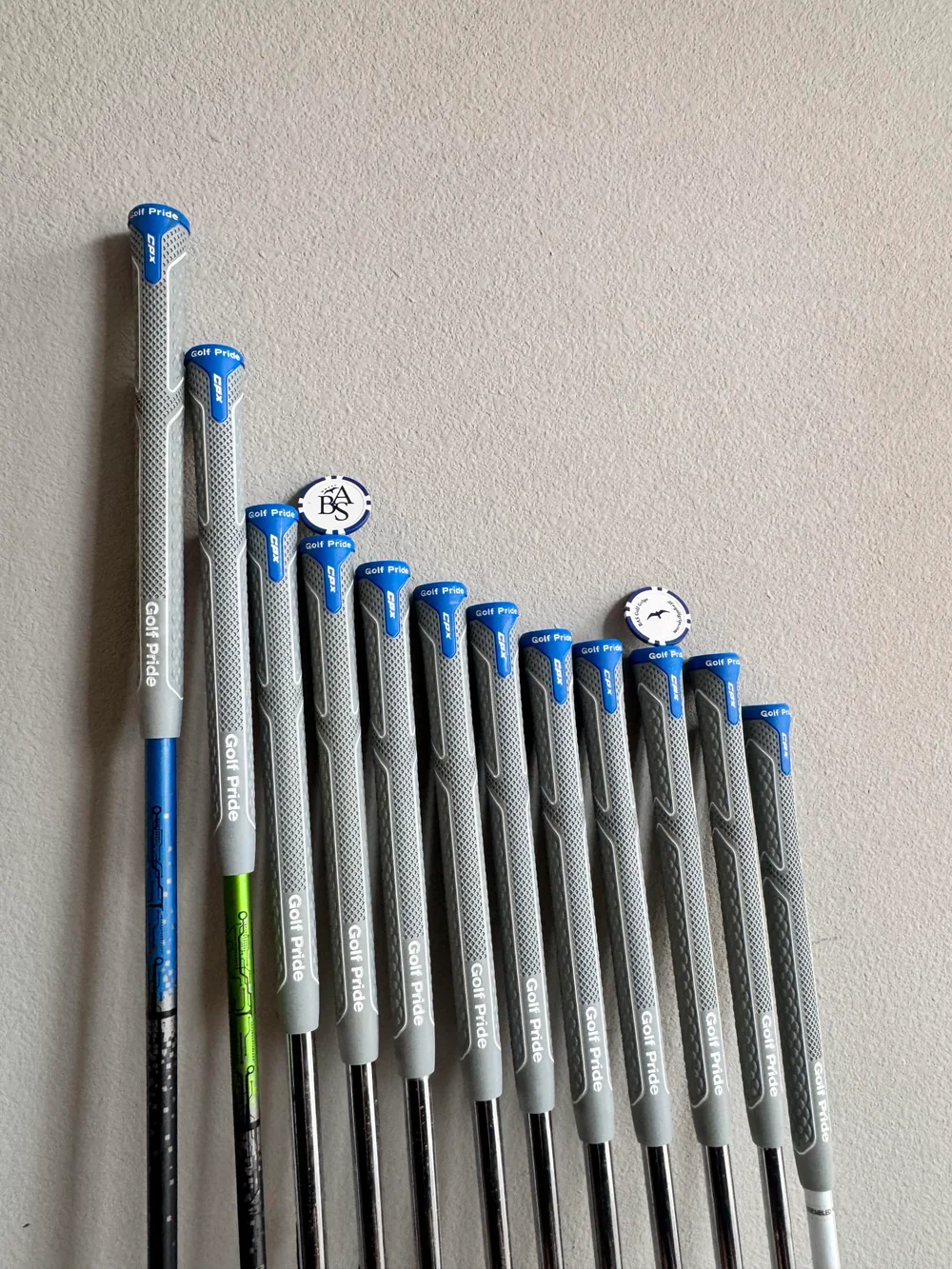 Finished set of golf clubs with steel and graphite shafts