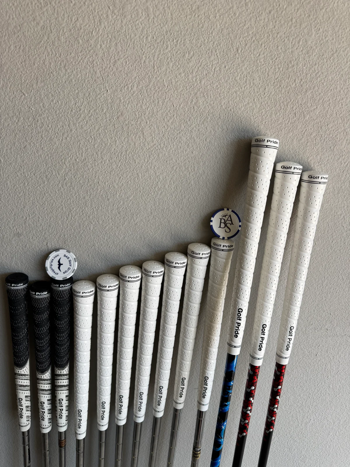 Finished golf clubs with steel and colorful graphite shafts