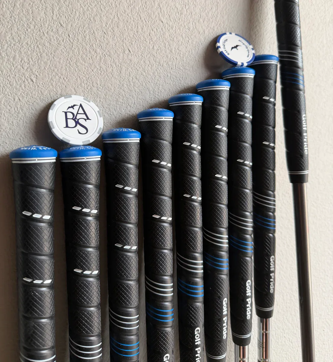 Finished Golf Pride Tour Wrap and MCC grips arranged in a full club set