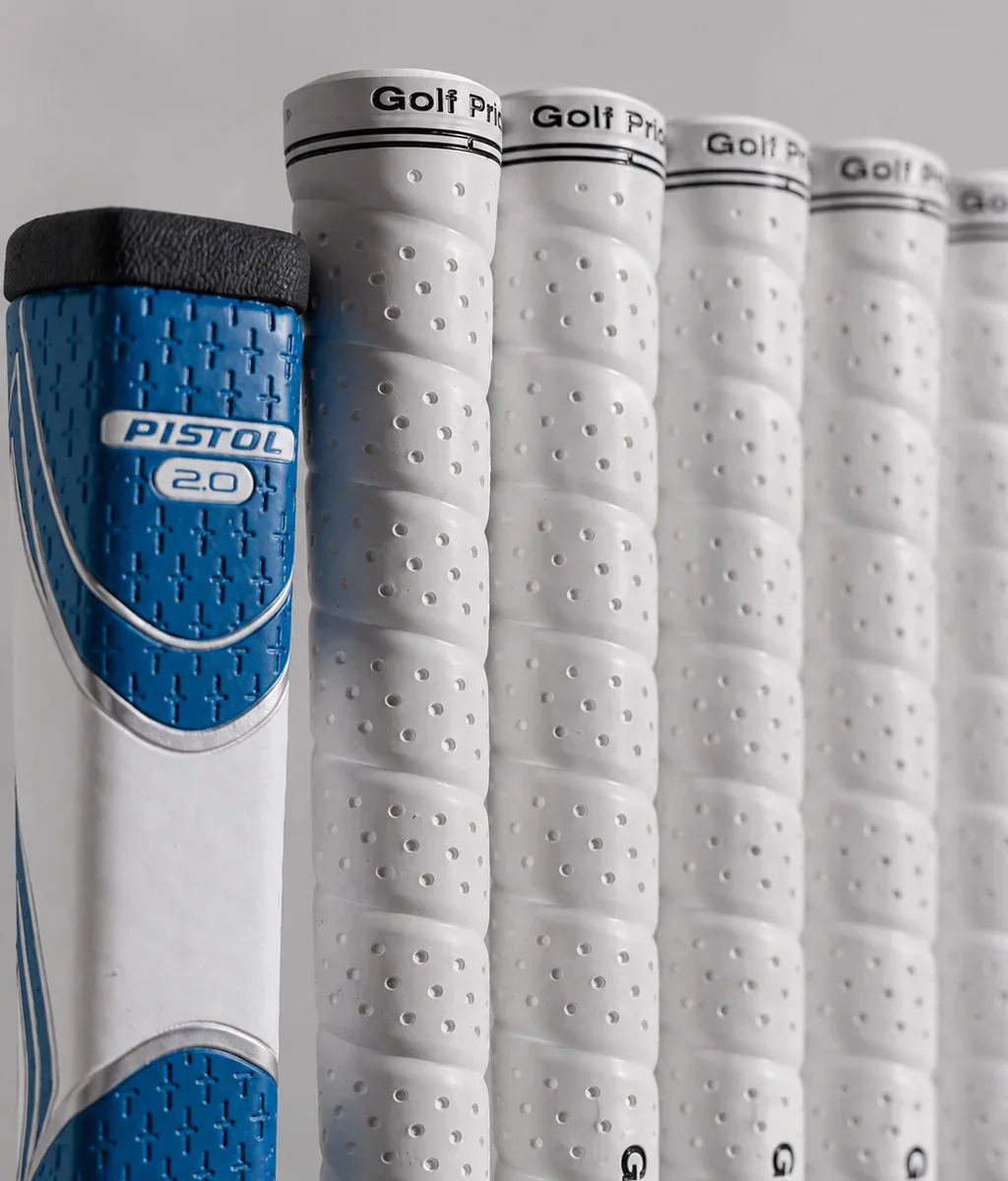 White Golf Pride grips and a blue putter grip