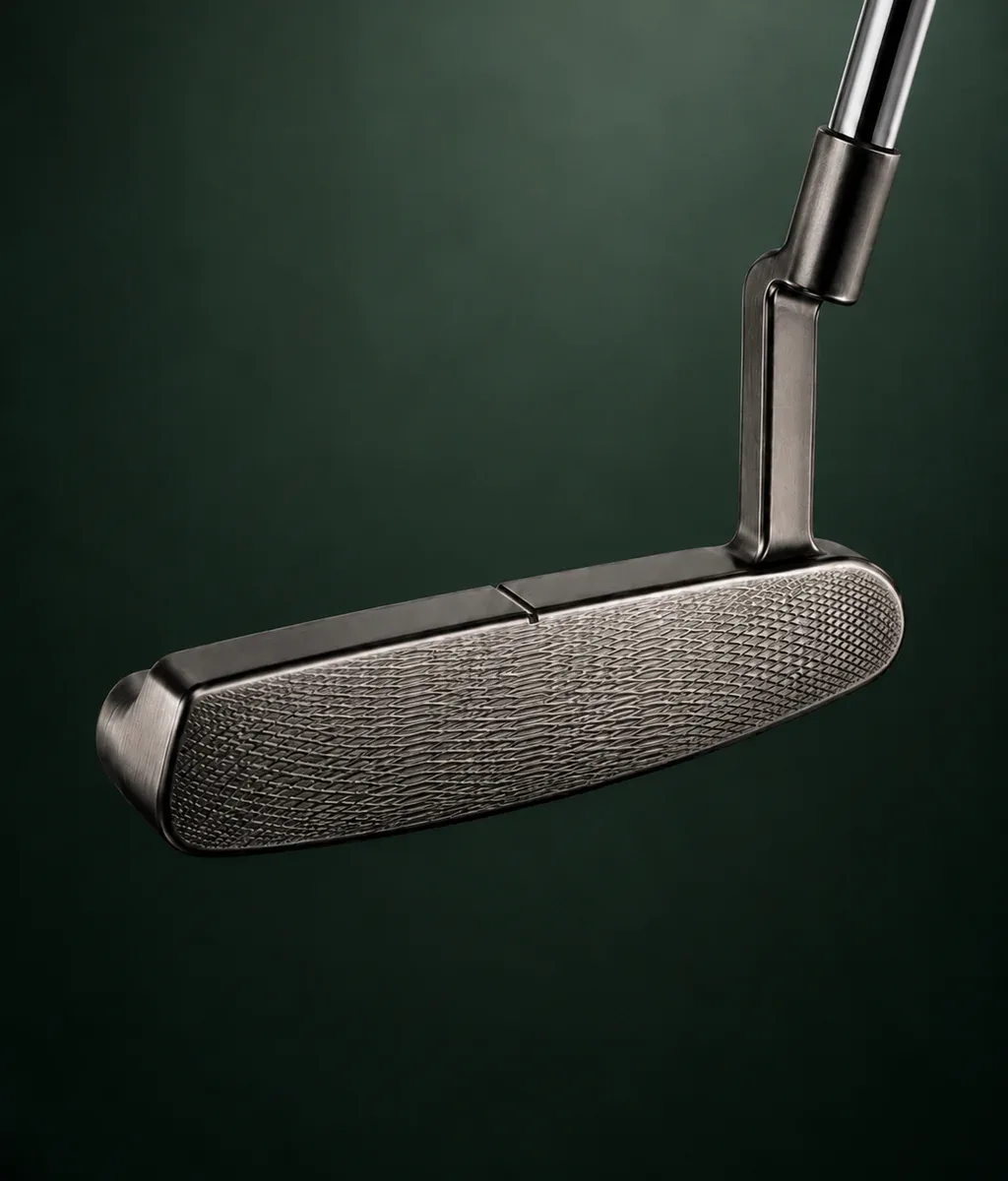 Close view of a restored dark metal putter face