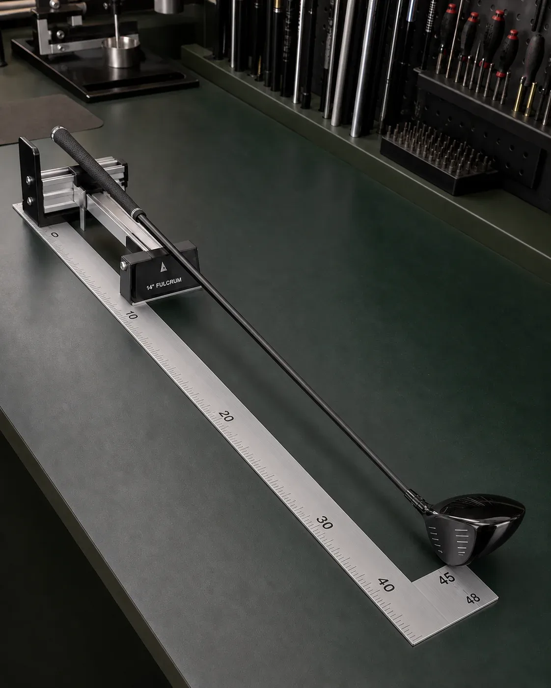 Finished driver measured on a club-length ruler and swingweight scale